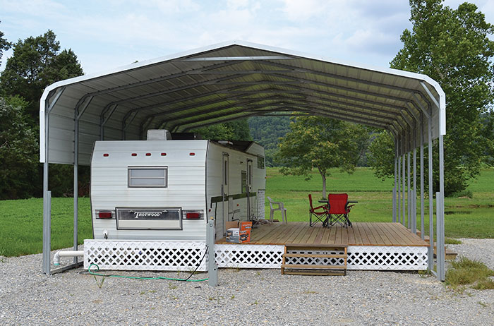 RV Cover 22'W x 36'L x 10'H with extra panel and 6 supports - photos © AllSteelCarports.com